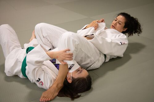 Women practicing judo in Ann Arbor