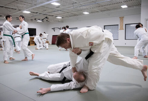 Two martial artists in Ann Arbor practicing judo