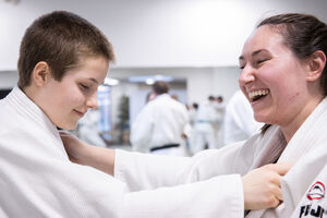 Two martial artists in Ann Arbor smiling