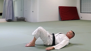 Suino Sensei slapping the mat | Martial Arts Ann Arbor