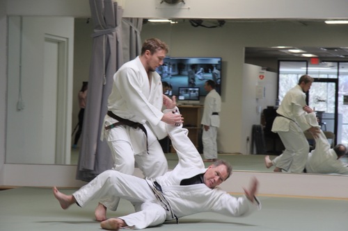 Two people practicing martial arts in Ann Arbor