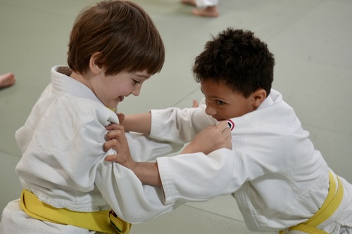 Two kids practicing martial arts at a karate school in Ann Arbor 